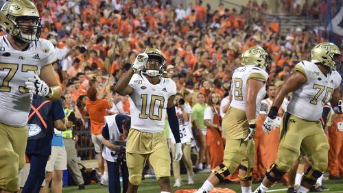 Georgia Tech wide receiver Ahmarean Brown (10) celebrates after he scored a touchdown pass in the second half at Clemson on Thursday, August 29, 2019. (Hyosub Shin / Hyosub.Shin@ajc.com)