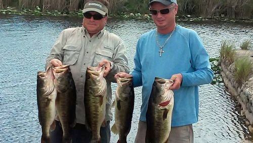 Rodd Sayler, left, and Steve Forssell, shown here with their King of the Glades Classic-winning bass catch, said they will target big bass when the 2016 trail begins next month. (photo courtesy Mike Lendl)