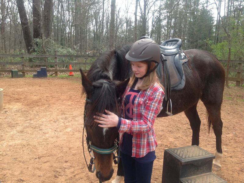 High Meadows sixth-grader Madison Kaul was among those at the Roswell school who helped nurse Bella Luna back to health. When she arrived there last year, the thoroughbred wasn’t expected to survive. CONTRIBUTED BY ANGELA LOCKARD