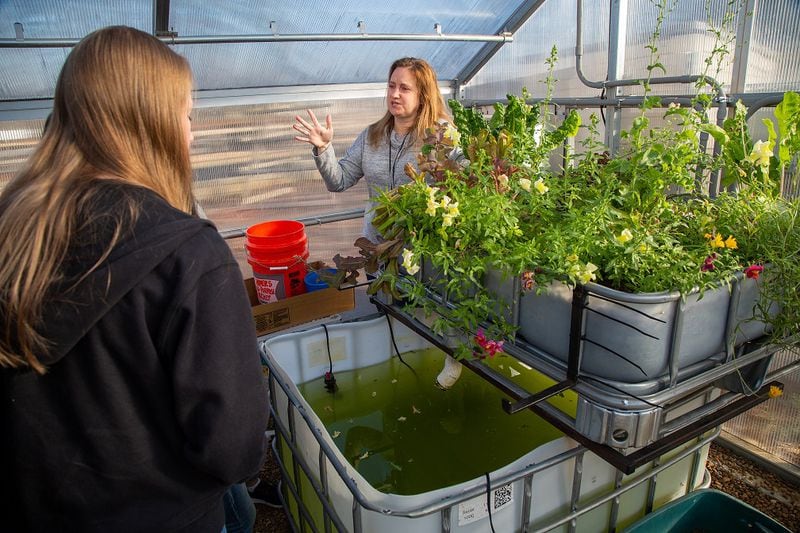 Cornerstone Preparatory Academy teacher Terri Haas (right, CQ) talks to her students about the school's Hydroponic garden at the Acworth campus on January 25th, 2019. For AJC Top Workplaces story. (Photo by Phil Skinner)