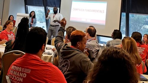 Marlon Marshall, the founder of the campaign consulting firm 270 Strategies, leads a “Running for Office 101” training session Friday during the Moms Demand Action “Gun Safety University” conference in Atlanta. Maya T. Prabhu/maya.prabhu@ajc.com