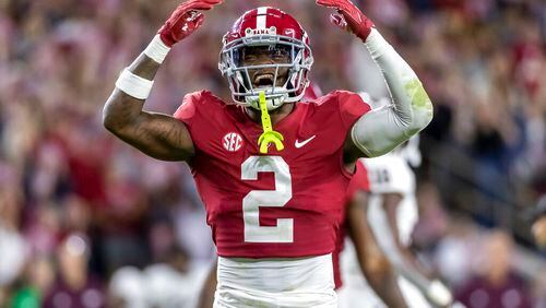 Alabama defensive back DeMarcco Hellams (2) cheers after a stop of Texas A&M during the second half of an NCAA college football game Saturday, Oct. 8, 2022, in Tuscaloosa, Ala. (AP Photo/Vasha Hunt)