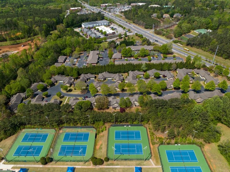 April 20, 2022 Powder Springs - Aerial photograph shows proposed area of the city of Lost Mountain in West Cobb on Wednesday, April 20, 2022. Tennis courts at Lost Mountain Park are shown in foreground. The story plays on a fear shared by many West Cobb residents as they decide whether to incorporate the city of Lost Mountain. The county they call home is changing around them, and as conservative political power wanes in the growing Atlanta suburb, many feel helpless to protect their neighborhoods from encroaching development.(Hyosub Shin / Hyosub.Shin@ajc.com)