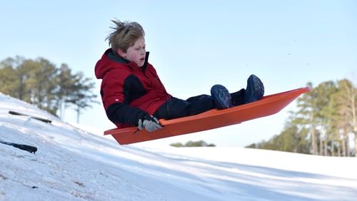 Atlanta kids enjoyed their snow days, but will have longer school days for a while as a result.