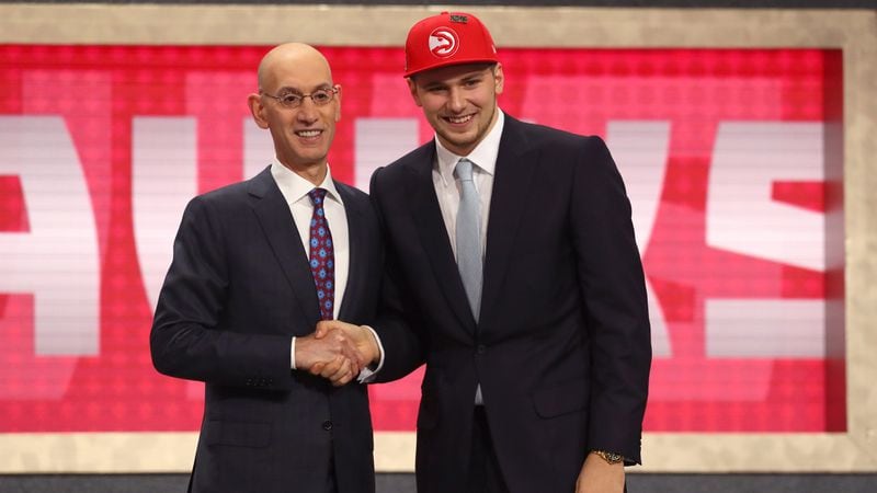 NEW YORK, NY - JUNE 21:  Luka Doncic poses with NBA Commissioner Adam Silver after being drafted third overall by the Atlanta Hawks during the 2018 NBA Draft at the Barclays Center on June 21, 2018 in the Brooklyn borough of New York City. 