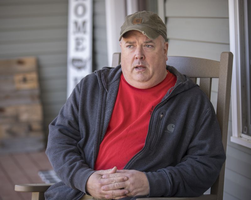David Bennett, an Army veteran and flight nurse, speaks on his front porch on Wednesday, Feb. 21, 2024 near Brooklet, Ga. Bennett opposes the proposed wells and worries how industrial growth in the region will change his community. (AJC Photo/Stephen B. Morton)
