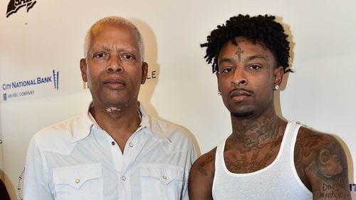 U.S. Rep. Hank Johnson with 21 Savage at the rapper’s back-to-school giveaway in August. Photo: Moses Robinson/Getty Images North America