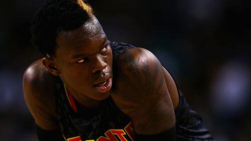 BOSTON, MA - DECEMBER 18: Dennis Schroder #17 of the Atlanta Hawks looks on during the second quarter against the Boston Celtics at TD Garden on December 18, 2015 in Boston, Massachusetts.NOTE TO USER: User expressly acknowledges and agrees that, by downloading and/or using this photograph, user is consenting to the terms and conditions of the Getty Images License Agreement. (Photo by Maddie Meyer/Getty Images)