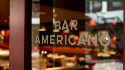 Get $3 drinks plus free meat and cheese snacks during Bar Americano's happy hour. Photo credit: Green Olive Media.