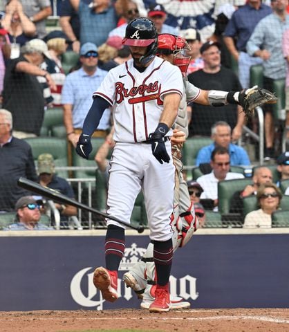 Atlanta Braves' Dansby Swanson reacts after striking out to end the fourth inning of game one of the baseball playoff series between the Braves and the Phillies at Truist Park in Atlanta on Tuesday, October 11, 2022. (Hyosub Shin / Hyosub.Shin@ajc.com)