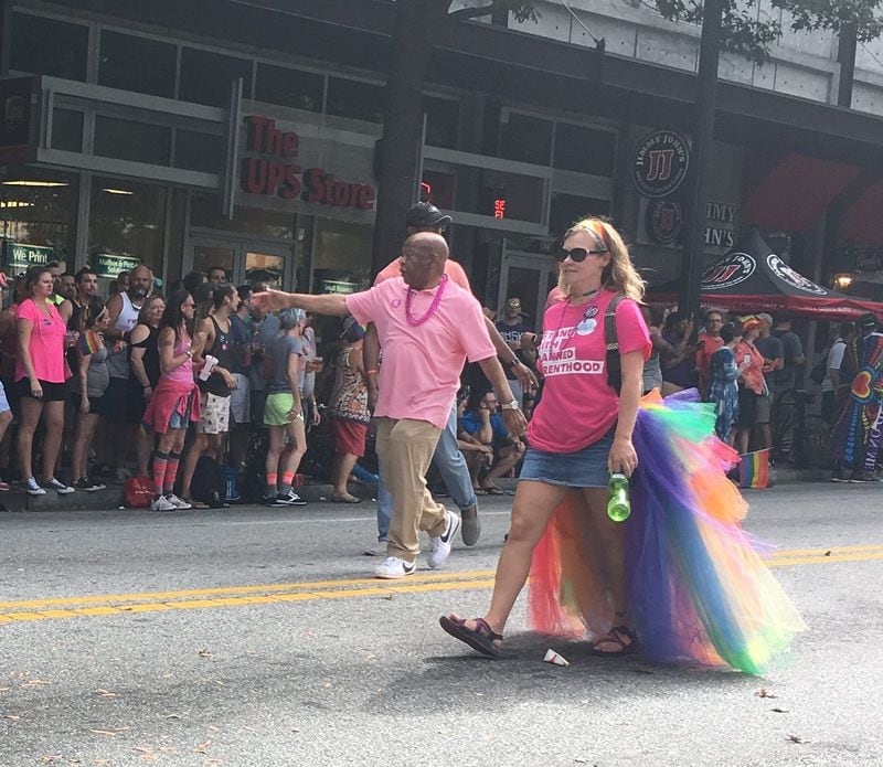 U.S. Rep. John Lewis greets the crowd at the Atlanta Pride parade in 2017. AJC/Greg Bluestein