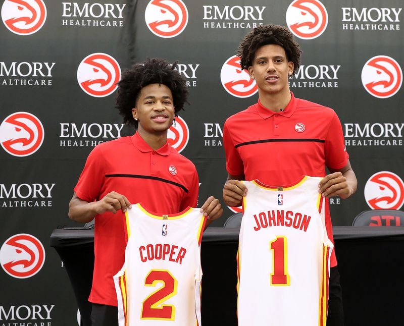 Hawks NBA draft picks Jalen Johnson (right, 20th overall pick) and Sharife Cooper (left, 48th overall pick) are introduced by the team on Friday, July 30, 2021, in Atlanta.   “Curtis Compton / Curtis.Compton@ajc.com”