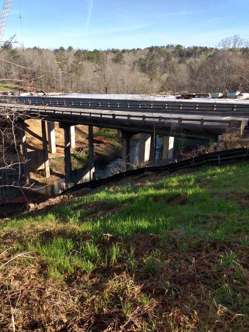 The Arnold Mill Road / Ga. 140 bridge carries traffic above Little River.  Close to this site was the location of the mill for which the road is named.