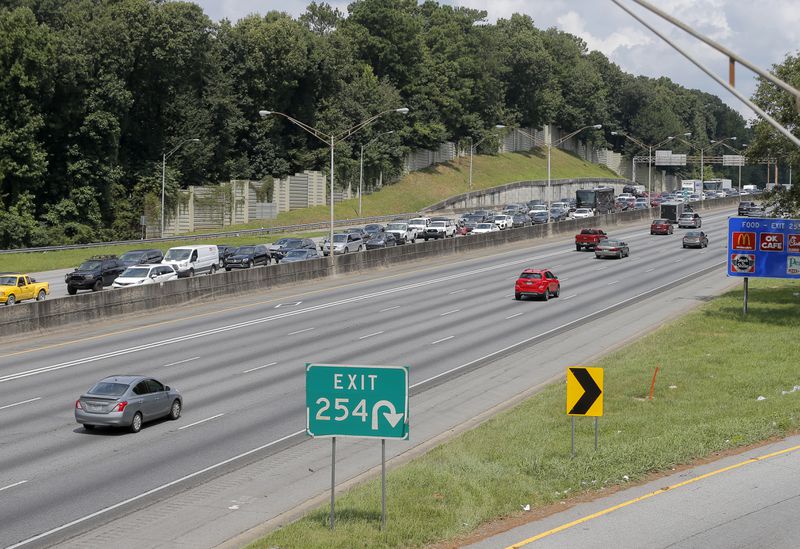 All but two left lanes had reopened by noon, according to the Georgia Department of Transportation. (Christine Tannous / christine.tannous@ajc.com)