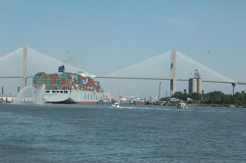 The cargo ship Cosco Development passes under the Talmadge Memorial Bridge en route to the Garden City Terminal on the Savannah River in May 2017. J. Scott Trubey/strubey@ajc.com
