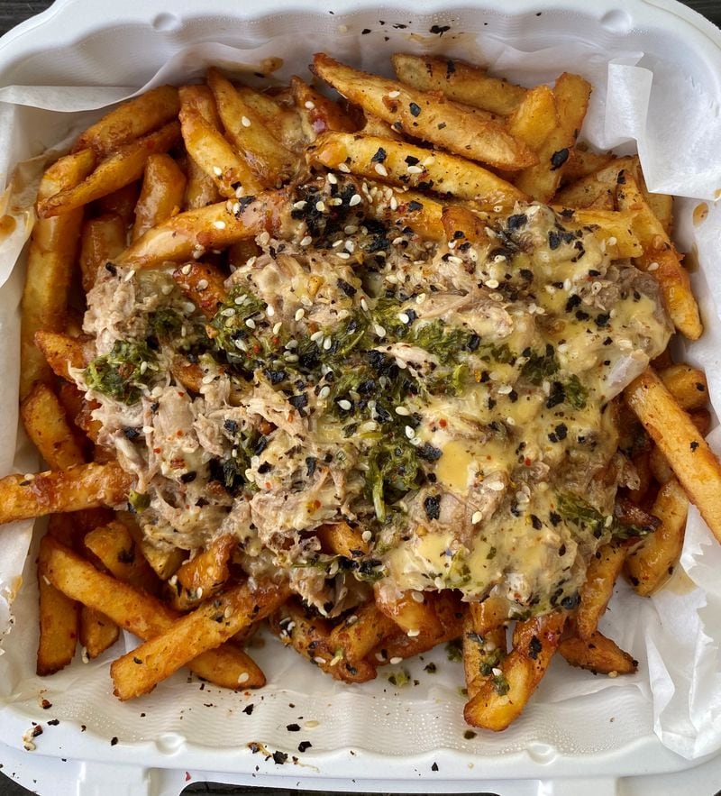 You can make a meal out of Mushi Ni’s loaded fries with duck confit, sweet chili sauce and chimichurri. Wendell Brock for The Atlanta Journal-Constitution