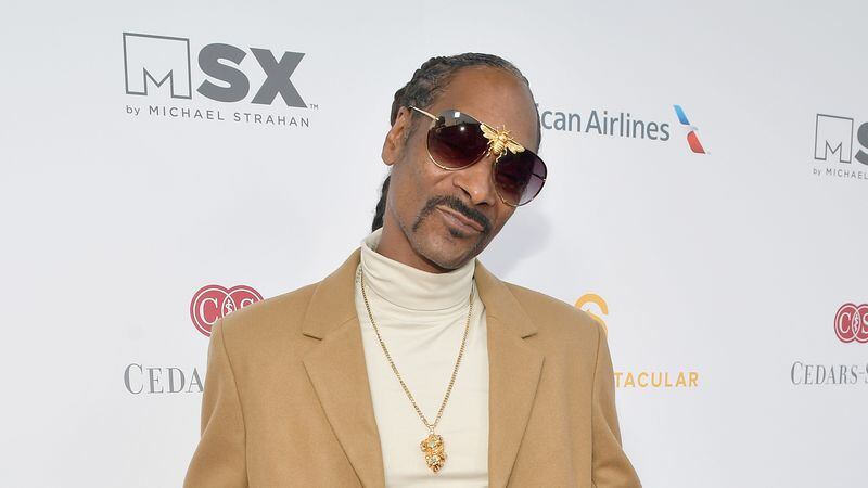 Snoop Dogg will release his first cookbook, "From Crook to Cook: Platinum Recipes from Tha Boss Dogg's Kitchen," in October. (Photo by Matt Winkelmeyer/Getty Images for Sports Spectacular)