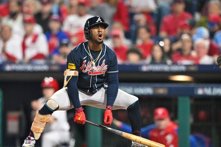Atlanta Braves’ Ozzie Albies reacts at the plate to a strike against the Philadelphia Phillies during the fourth inning of NLDS Game 3 in Philadelphia on Wednesday, Oct. 11, 2023.   (Hyosub Shin / Hyosub.Shin@ajc.com)