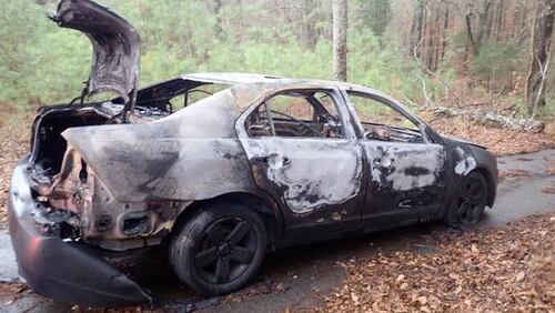 A car was found burned in the driveway of a vacant home in Auburn. The car had been reported stolen the same day.
