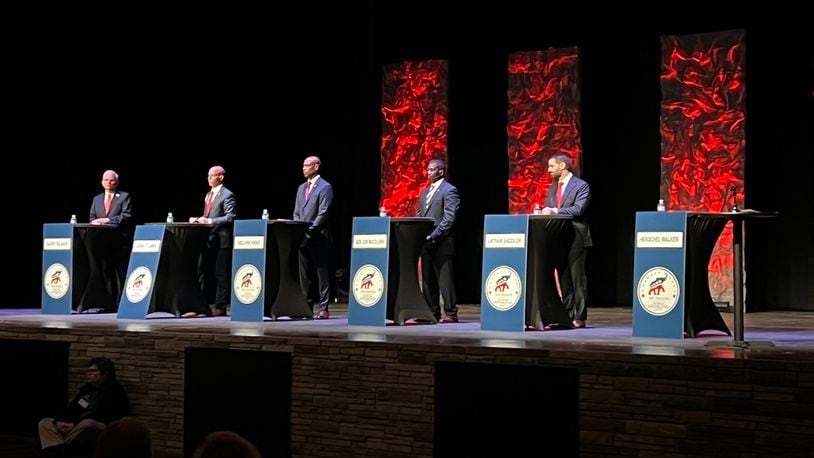 Herschel Walker is represented by an empty podium in this picture of the 9th District GOP Senate debate by Jonathan O’Brien of WDUN. 