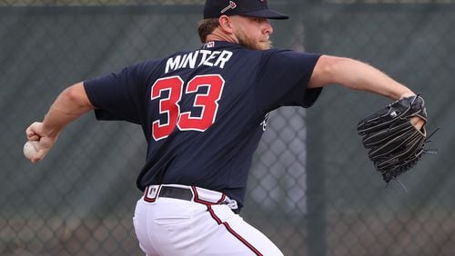 Braves pitcher A.J. Minter delivers a pitch during spring training on Friday, Feb. 14, 2020, in North Port.  Curtis Compton ccompton@ajc.com