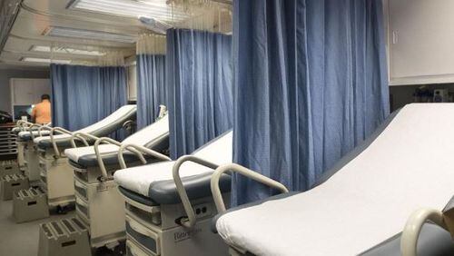 The interior of Carolinas MED-1, a mobile medical facility located outside of the Marcus trauma and emergency room at Grady Memorial Hospital, on Jan. 29. The facility houses 14 extra emergency room beds and has an operable emergency operating room. ALYSSA POINTER/ALYSSA.POINTER@AJC.COM