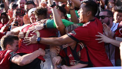 ATLANTA, GA - July 29  2017 ATLANTA, GA - July 29  2017  Atlanta United forward Hector 'Tito' Villalba jumped to the stands to celebrate with the fans after scoring the goal in extra time, the last game for the Atlanta United ends in a tie against the Orlando City at Bobby Dodd Stadium on Saturday, July 29, 2017, in Atlanta, Ga.