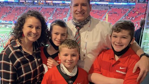 Georgia's first-year Athletic Director Josh Brooks is having to learn how to balance family life while overseeing a $150 million athletic department. (Family photo)