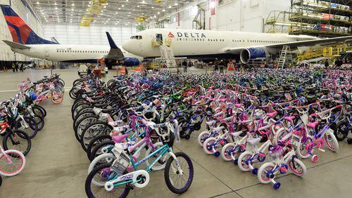 DECEMBER 4, 2015 ATLANTA Technicians at Delta's TechOps maintenance operation donated nearly 700 bikes (with helmets) to Marine Corps representatives Friday, December 4, 2015. Marine Corps Col Matt Puglisi, Commanding Officer, Combat Logistics Regiment 45, accepted the bikes, that were donated and assembled by Delta technicians, who work in 21 different shops, each specializing in an area like avionics, wheels and brakes, engines and airframes. There were also 2,500 toys donated. This is the 11th year TechOps has donated bicycles and toys. KENT D. JOHNSON/ kdjohnson@ajc.com
