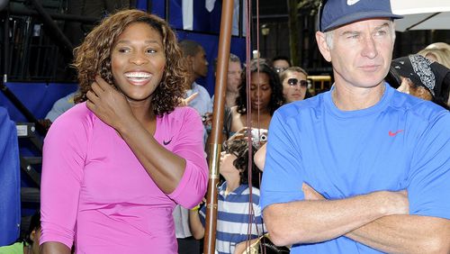 Serena Williams looks on with John McEnroe before their match at the DIRECTV ESPN US Open Experience promoting DIRECTV’s mosaic coverage of the US Open August 26, 2009 at Bryant Park in New York Cty. (Rob Tringali/Getty Images for DirecTV)