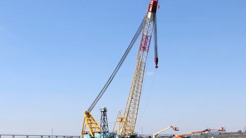 /// The Chesapeake 1000 crane, which will be used to help remove wreckage from the collapse of the Key Bridge, is docked at Tradepoint Atlantic in Sparrows Point, Md. on Friday, March 29, 2024. (AP Photo/Brian Witte)
