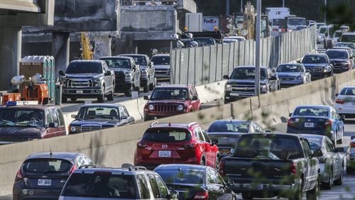 The Georgia Department of Transportation expects metro Atlanta traffic to jump as much as 20 percent beginning Monday. JOHN SPINK/AJC