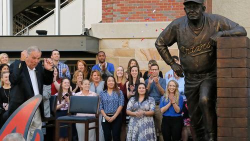 Bobby Cox enjoys the unveiling of his bronze self outside Cobb County Taxpayer Park. (BOB ANDRES /BANDRES@AJC.COM)