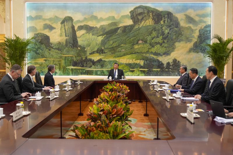 Chinese President Xi Jinping, centre, holds a meeting with U.S. Secretary of State Antony Blinken, third left, and officials at the Great Hall of the People, Friday, April 26, 2024, in Beijing, China. (AP Photo/Mark Schiefelbein, Pool)