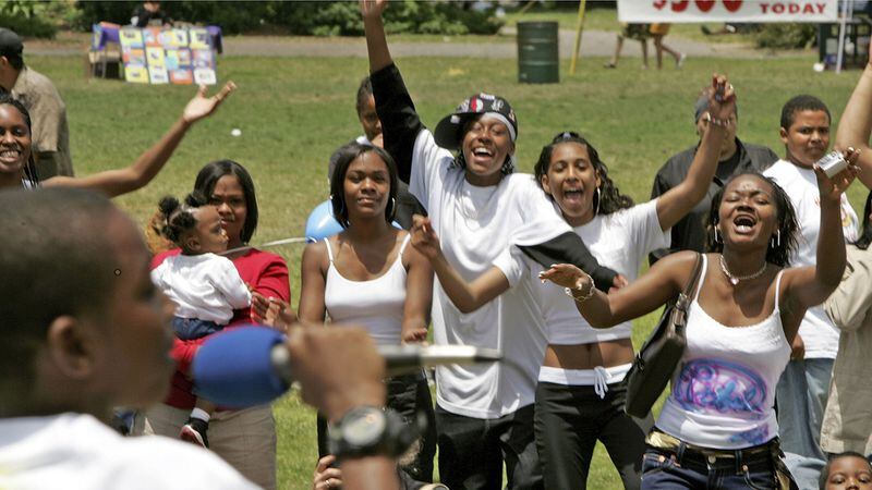 People attend Juneteenth celebrations at Nichol Park on June 19, 2004 in Richmond, California.