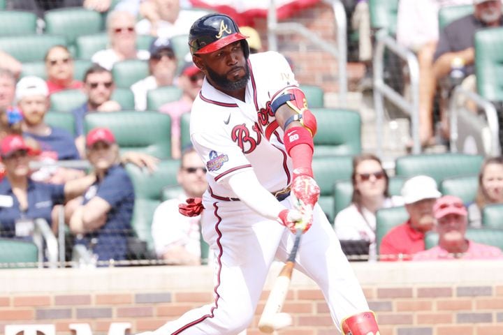 Braves left fielder Marcell Ozuna hits into a double play in the ninth inning that finished the game Wednesday at Truist Park. (Miguel Martinez/miguel.martinezjimenez@ajc.com)