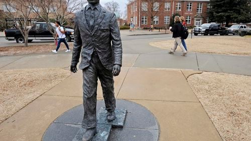 The James Meredith statue is seen on the University of Mississippi campus in Oxford, Miss., Monday, Feb. 17, 2014. A $25,000 reward is available for information leading to the arrest of two men involved in sullying the statue early Sunday, Feb. 16. (AP Photo/The Daily Mississippian, Thomas Graning)