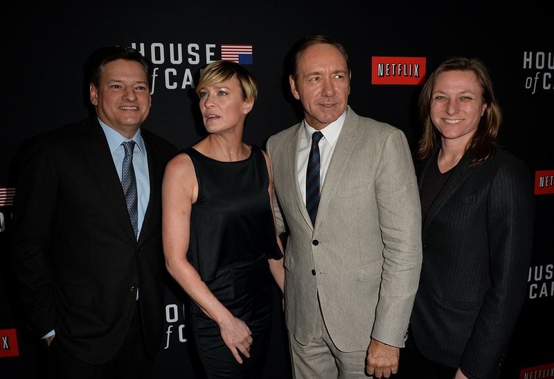 LOS ANGELES, CA - FEBRUARY 13:  (L-R) Netflix chief content officer Ted Sarandos, actress Robin Wright, executive producer/actor Kevin Spacey and Netflix Vice president for original series Cindy Holland arrive at the special screening of Netflix's "House of Cards" Season 2 at the Directors Guild Of America on February 13, 2014 in Los Angeles, California.  (Photo by Kevin Winter/Getty Images)