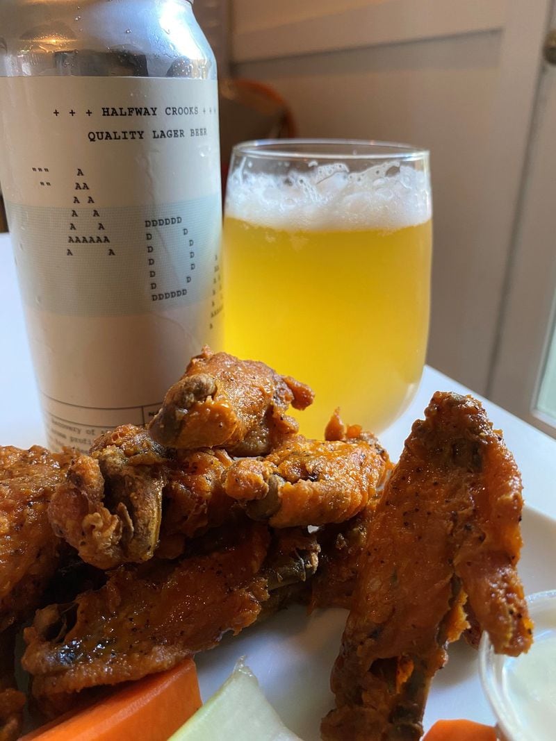 Halfway Crooks lemon pepper chicken wet wings and ADA German-style Pilsner are available for takeout. CONTRIBUTED BY BOB TOWNSEND