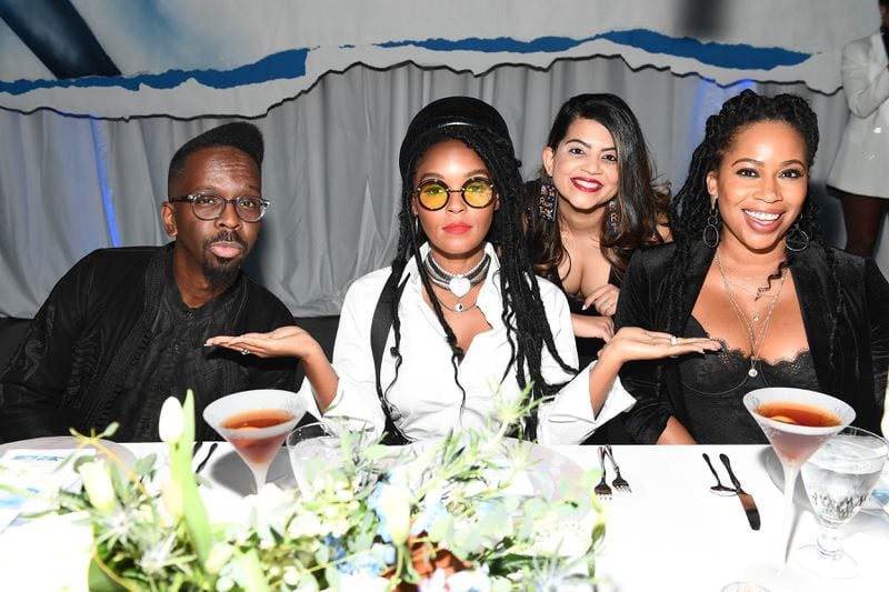 Fahamu Pecou, Janelle Monae,  Nikishka Iyengar and Christina Rice pose for a photo as Belvedere Vodka and Janelle Monae present "A Beautiful Future" at The Fairmont on December 05, 2019 in Atlanta, Georgia. (Photo by Marcus Ingram/Getty Images for Belvedere Vodka)