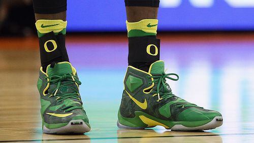 SPOKANE, WA - MARCH 18: Nike shoes are worn by a player on the Oregon Ducks as he takes on the Holy Cross Crusaders in the first half during the first round of the 2016 NCAA Men's Basketball Tournament at Spokane Veterans Memorial Arena on March 18, 2016 in Spokane, Washington. (Photo by Patrick Smith/Getty Images)