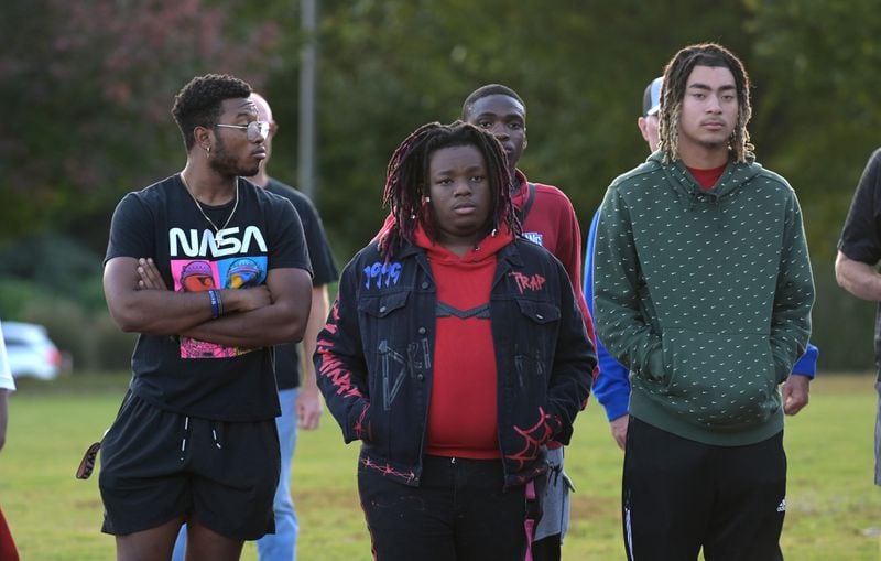 Dwayne Jacobs (from left), Tyrece Young, and Raquan Miller, students participating in University of West Georgia lecturer Michael Hester’s class “What do you know about multicultural achievement” participate in the second annual “We Stand Together”, a diversity and inclusion march held on the campus of the University of West Georgia Thursday, Oct. 21, 2021 in Carrolton. The event was sponsored by the Student Athletic Advisory Counsel and the NCAA Diversity and Inclusion Week social media campaign. Hester encouraged his students to attend and ask participants why they came as an extra credit assignment. (Daniel Varnado/ For the Atlanta Journal-Constitution)