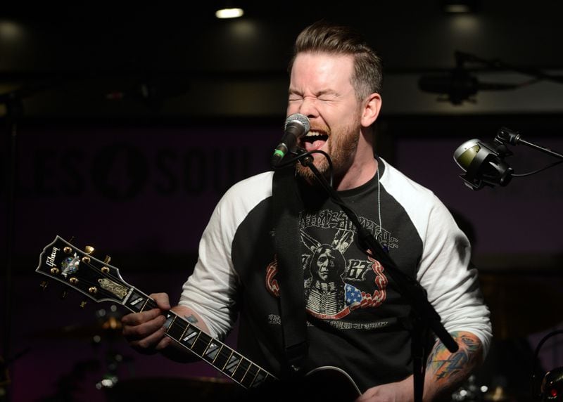 NASHVILLE, TN - APRIL 01:  Singer-songwriter David Cook performs at the Soles4Souls charity concert, sponsored by Barefoot Wine & Bubbly at the Bridge Building on April 1, 2014 in Nashville, Tennessee.  (Photo by Jason Davis/Getty Images for Barefoot Wines)