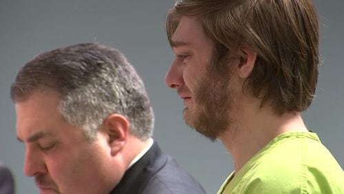 Joshua David Richards, 21, wept while the judge read the charges against him Monday in Carroll County.