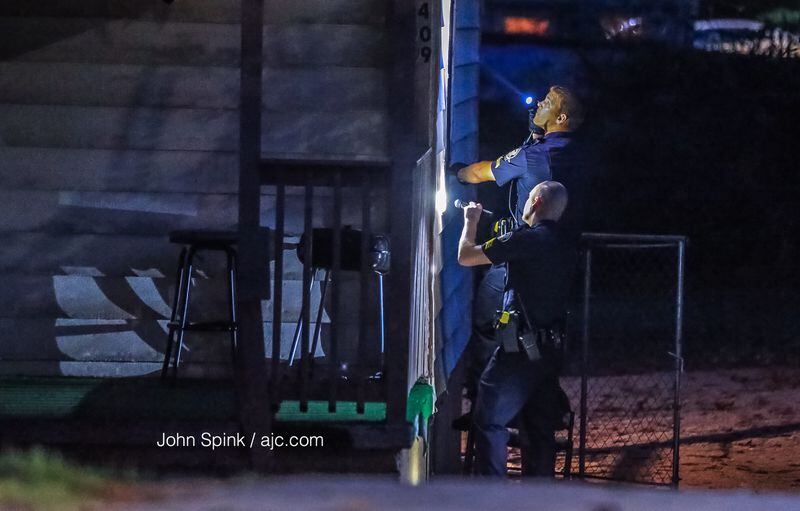 Police are investigating a shooting in the 1400 block of Avon Avenue in southwest Atlanta. JOHN SPINK / JSPINK@AJC.COM