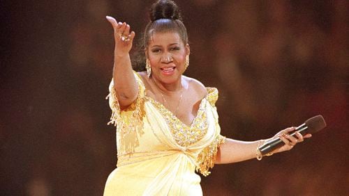 FILE - In this Jan. 19, 1993 file photo, singer Aretha Franklin performs at the inaugural gala for President Bill Clinton in Washington.  Franklin died Thursday, Aug. 16, 2018 at her home in Detroit.  She was 76. (AP Photo/Amy Sancetta, File)