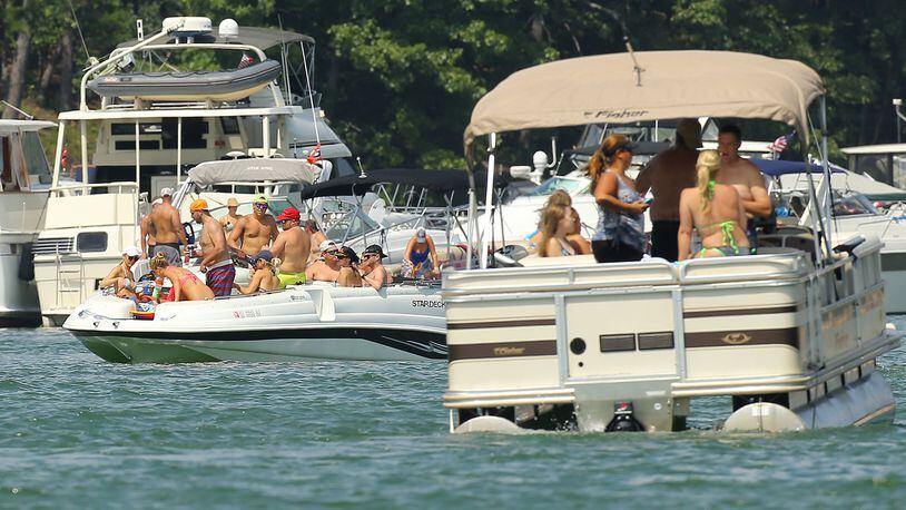 BUSY BOATING WEEKEND--090615 FLOWERY BRANCH: Boaters take to the water in Sunset Cove at Lake Lanier on Sunday, Sept. 6, 2015, near Flowery Branch. Georgia may be headed to it's lowest number of boating accidents in more than a decade, but state officials have cautioned they are taking no chances. Curtis Compton / ccompton@ajc.com