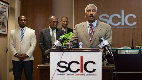 Atlanta NAACP President Richard Rose speaks during a press conference calling for a meeting with Gov. Nathan Deal to demand removal of all symbols of the Confederacy from state-owned and operated buildings, Friday, July 31, 2015, in Atlanta.