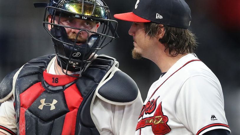 August 13, 2019 Atlanta: Atlanta Braves catcher Brian McCann confers with pitcher Luke Jackson during the seventh inning against the New York Mets in a MLB baseball game on Tuesday, August 13, 2019, in Atlanta.   Curtis Compton/ccompton@ajc.com