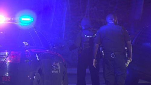 Atlanta police are searching for a driver who they say hit an officer leaving a gated community.